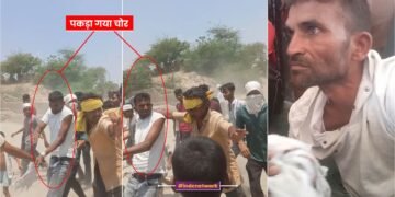 लोग चोर को पकड़ कर ले जाते हुए